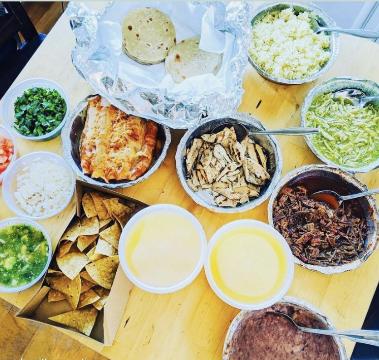 Overhead image of taco bar take out family meal.